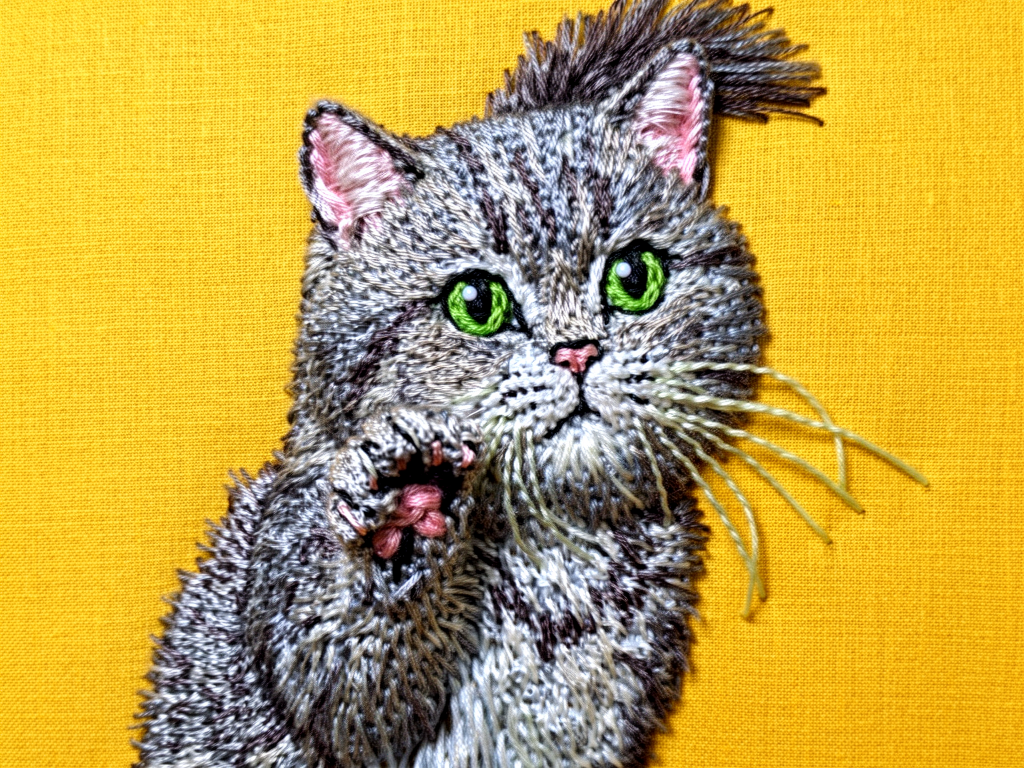 Embroidery Art style pet portrait showing colorful thread-work texture